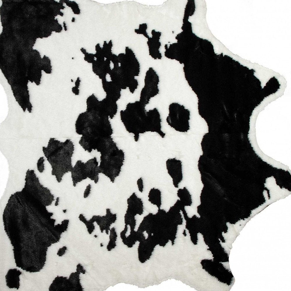 4' X 5' Brown And White Cowhide Print Hand Knotted Area Rug