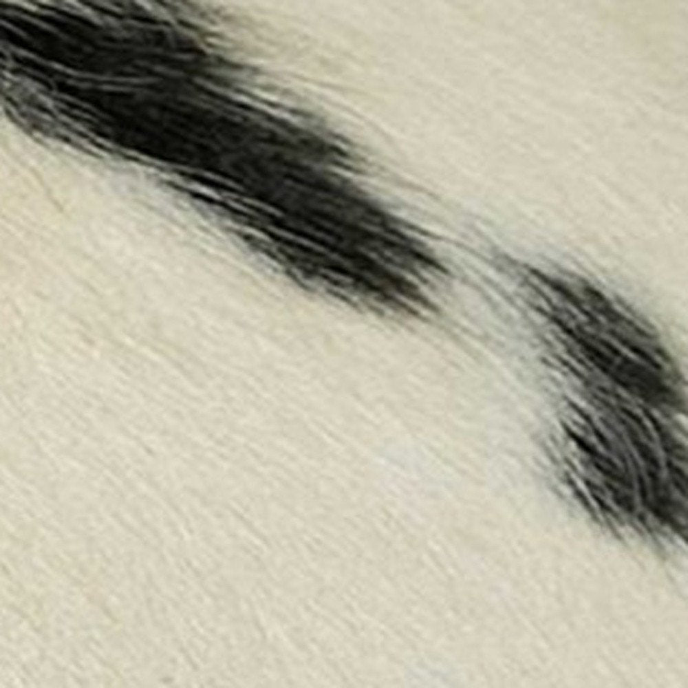 12" X 20" X 5" White And Black Cowhide Pillow