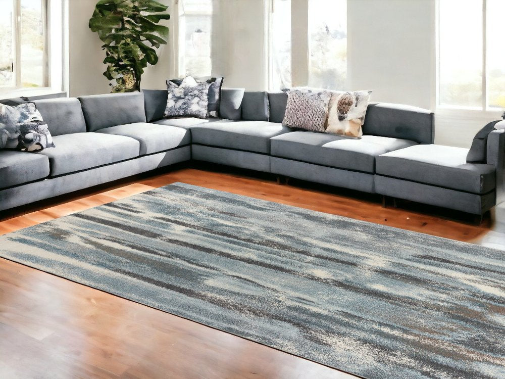 7' X 10' Teal Blue And White Abstract Distressed Area Rug