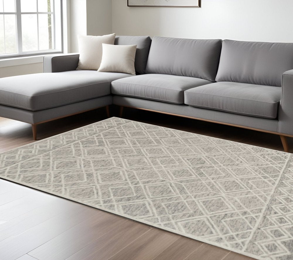 5' X 7' Sand Beige And Ivory Wool Geometric Hand Hooked Area Rug