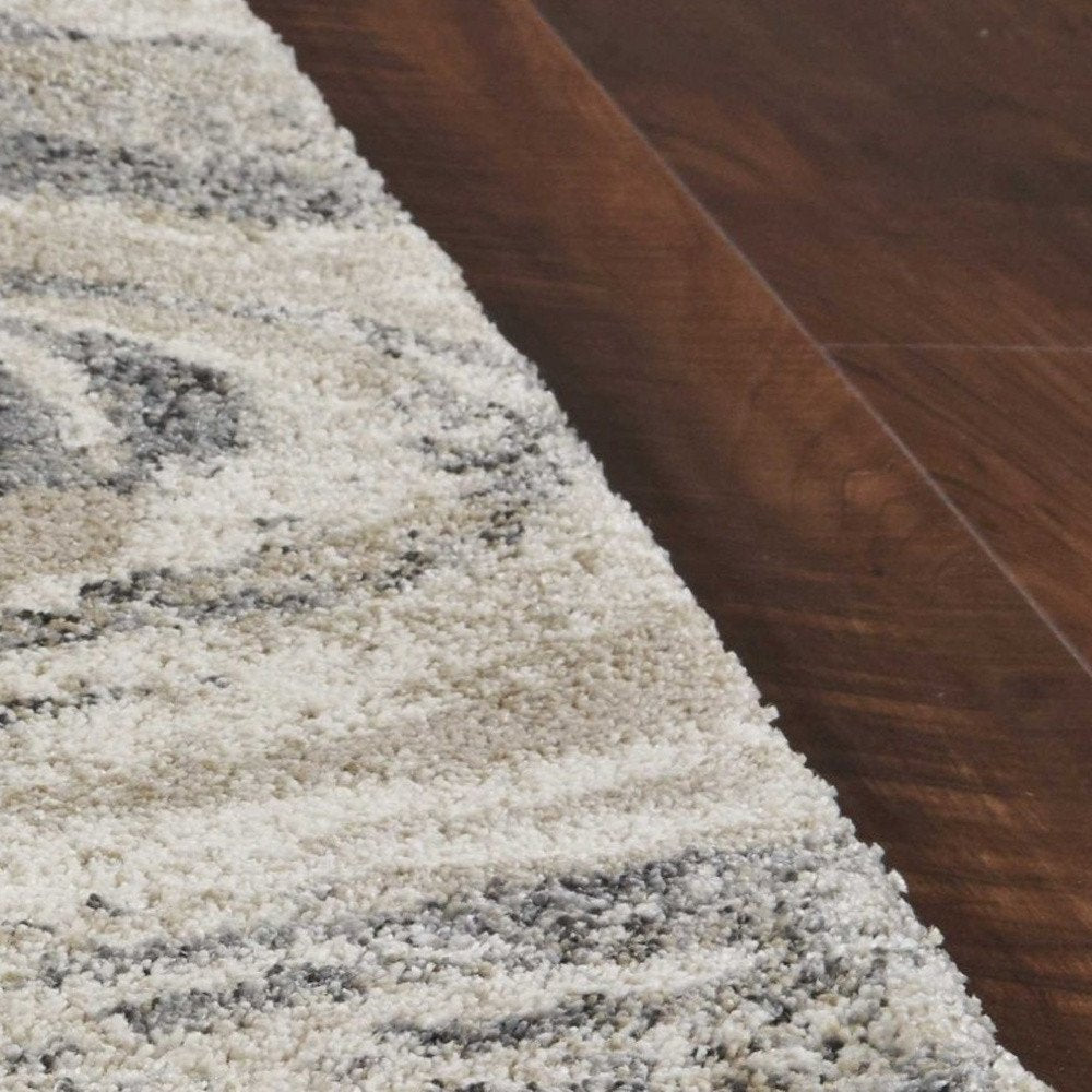 7' X 9' Gray And Tan Abstract Area Rug