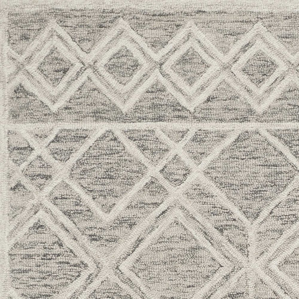 5' X 7' Sand Beige And Ivory Wool Geometric Hand Hooked Area Rug