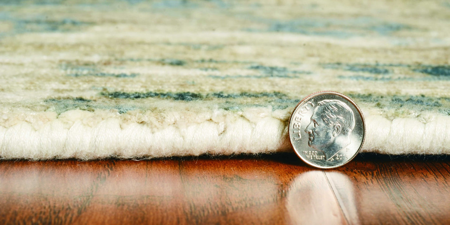 5' X 7' Beige And Blue Floral Medallion Hand Loomed Area Rug