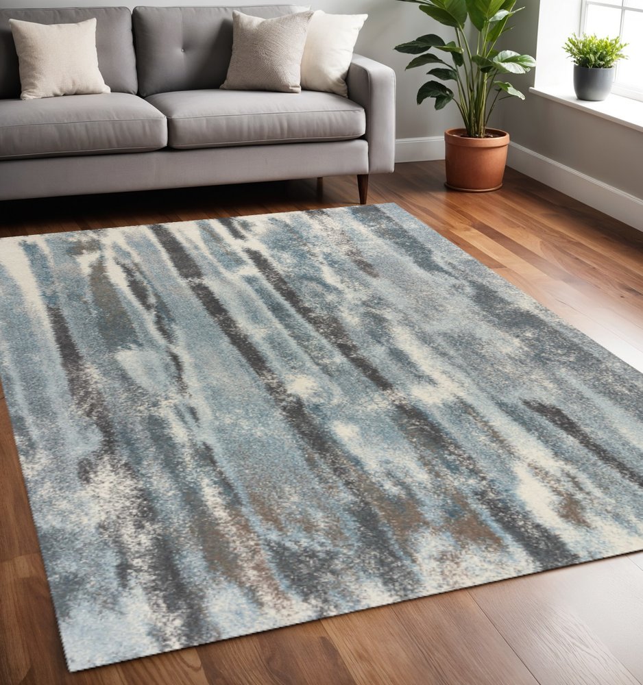 7' X 10' Teal Blue And White Abstract Distressed Area Rug