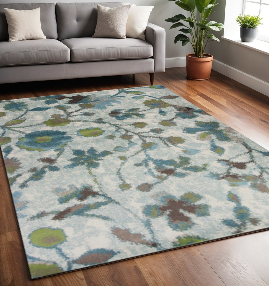 10' X 13' Teal Blue White And Green Floral Vines Area Rug