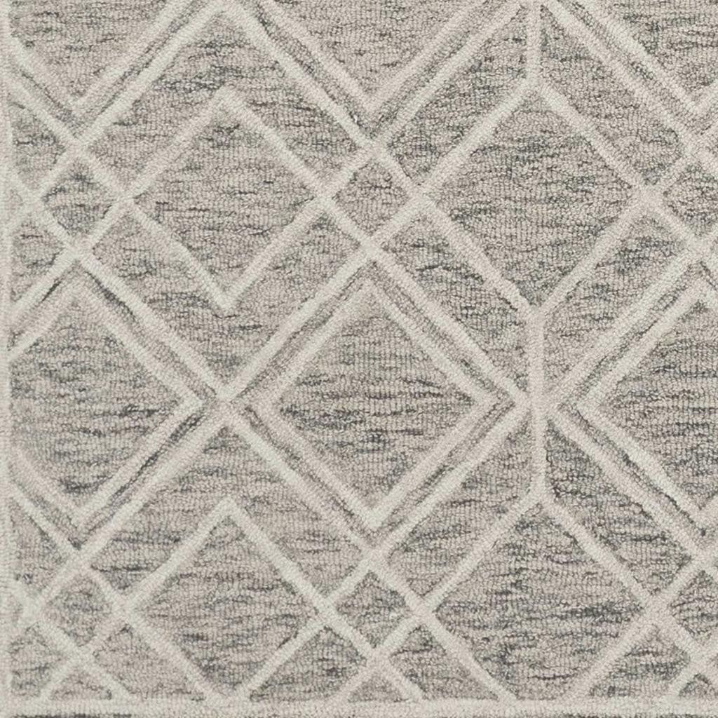 5' X 7' Sand Beige And Ivory Wool Geometric Hand Hooked Area Rug