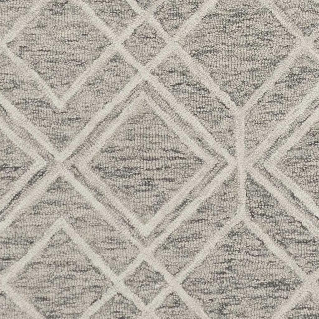 5' X 7' Sand Beige And Ivory Wool Geometric Hand Hooked Area Rug
