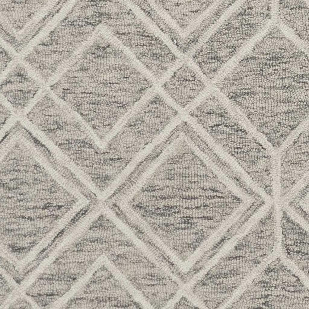 5' X 7' Sand Beige And Ivory Wool Geometric Hand Hooked Area Rug