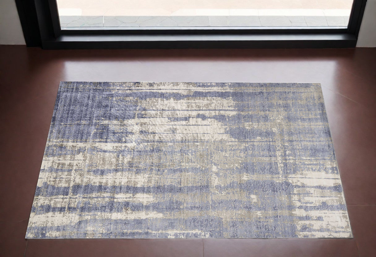 5' X 7' Gray And Ivory Abstract Hand Loomed Area Rug