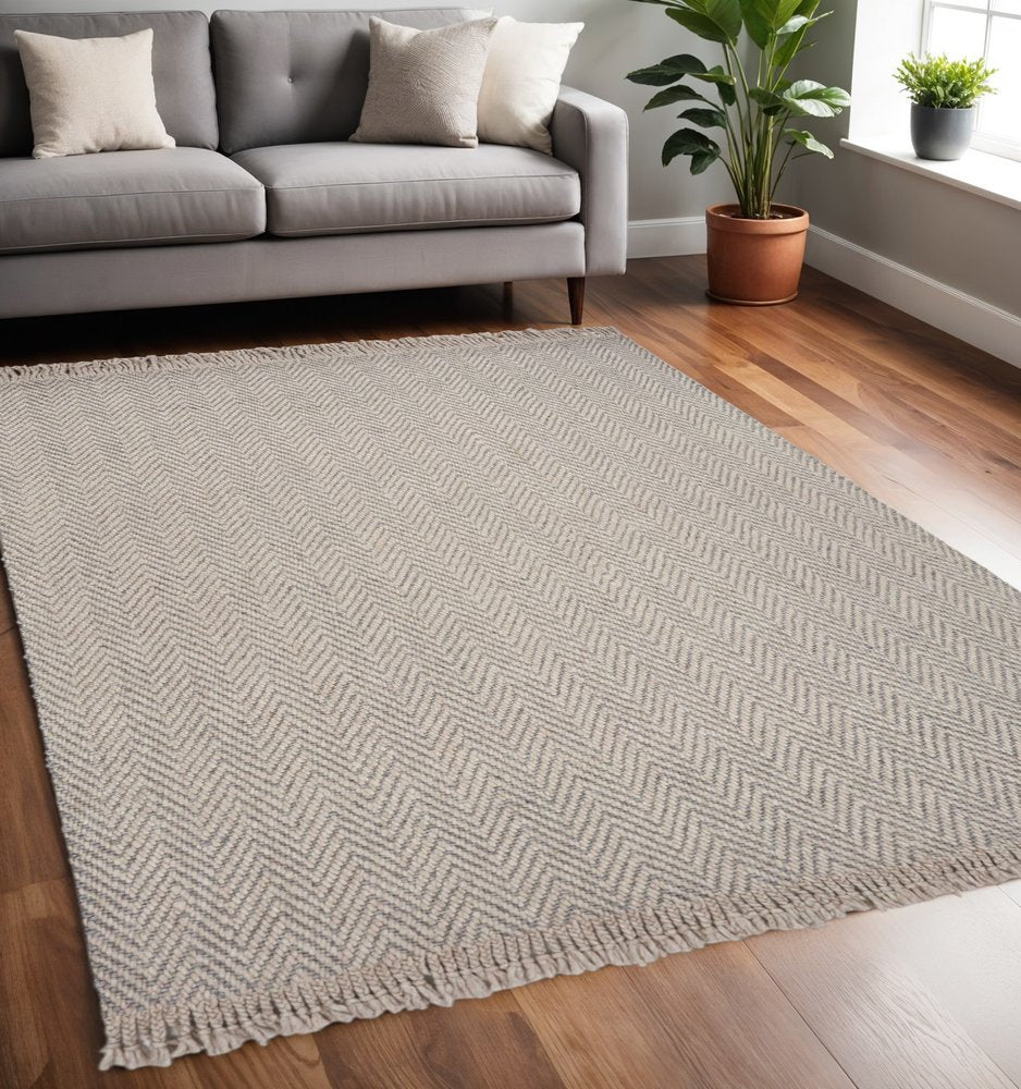 5' X 8' Beige And Gray Wool Chevron Hand Woven Area Rug