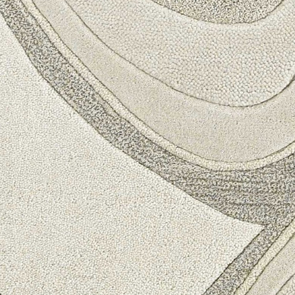 2' X 4' Ivory And Gray Wool Abstract Hand Tufted Area Rug