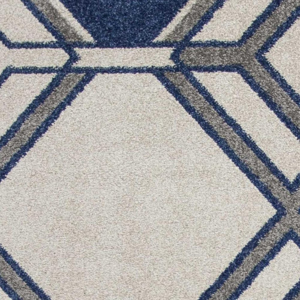 5' X 8' Blue Ivory And Gray Geometric Area Rug