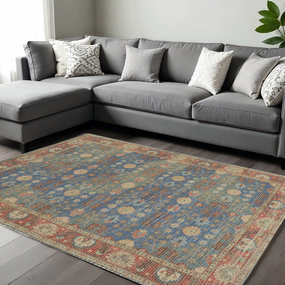7' X 9' Blue Red And Beige Floral Medallion Hand Woven Area Rug