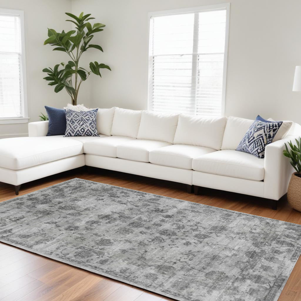 5' X 7' Beige Tan And Gold Abstract Hand Loomed Distressed Area Rug