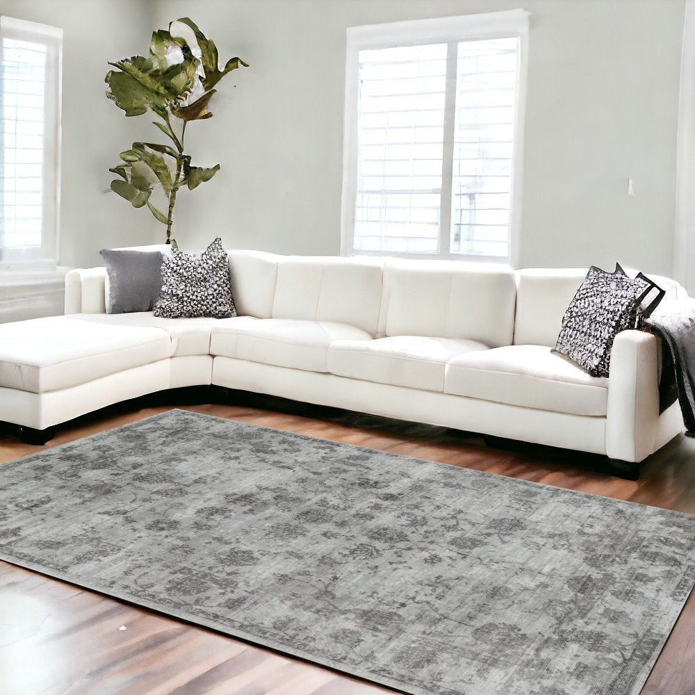 5' X 7' Beige Tan And Gold Abstract Hand Loomed Distressed Area Rug