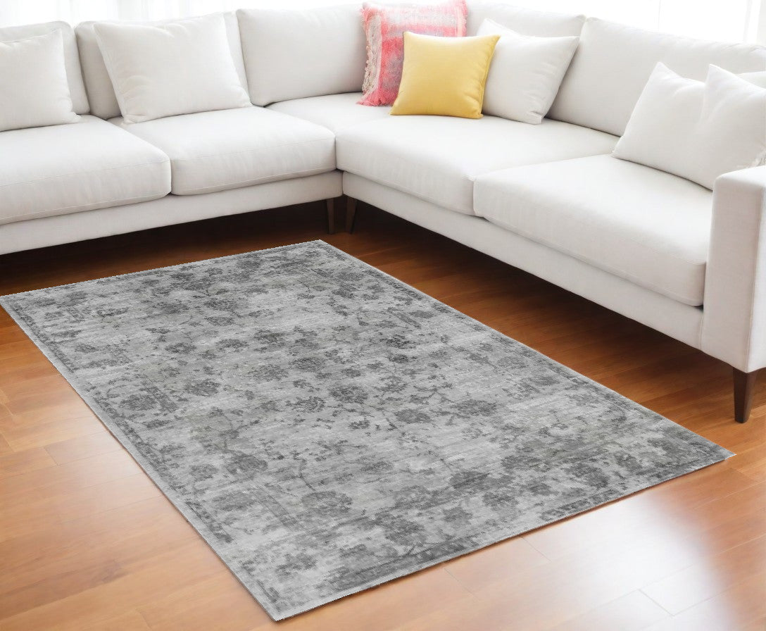 5' X 7' Beige Tan And Gold Abstract Hand Loomed Distressed Area Rug