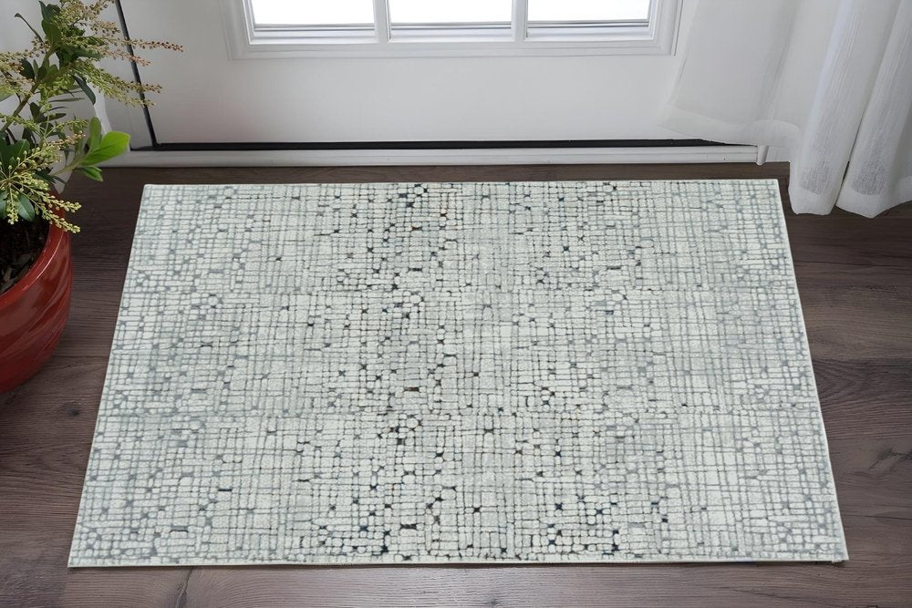 5' X 8' Gray And Black Abstract Distressed Area Rug