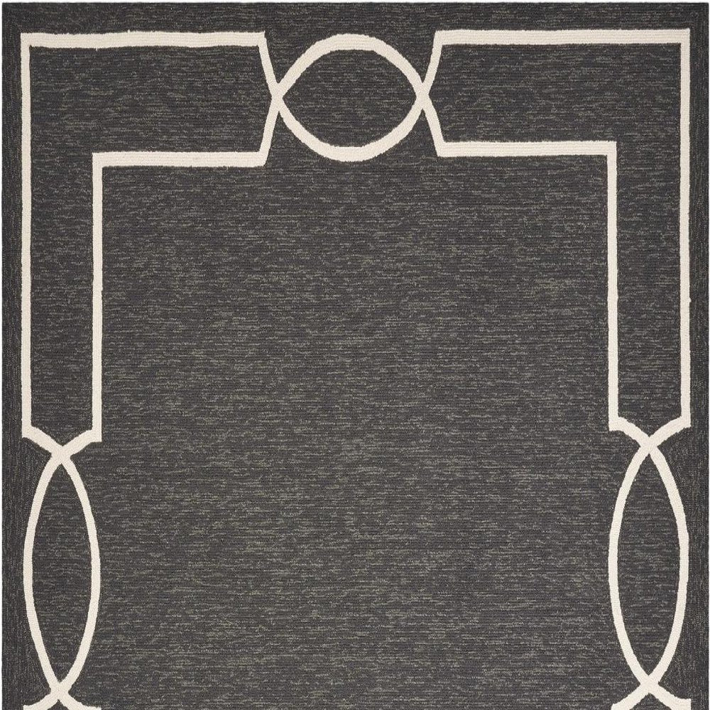 7' X 10' Onyx And White Geometric Handmade Indoor Outdoor Area Rug