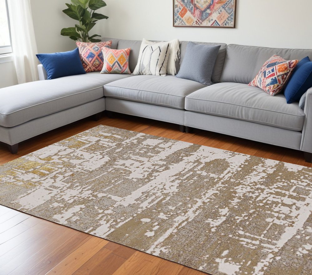 10' X 13' Ivory Taupe And Gold Abstract Area Rug