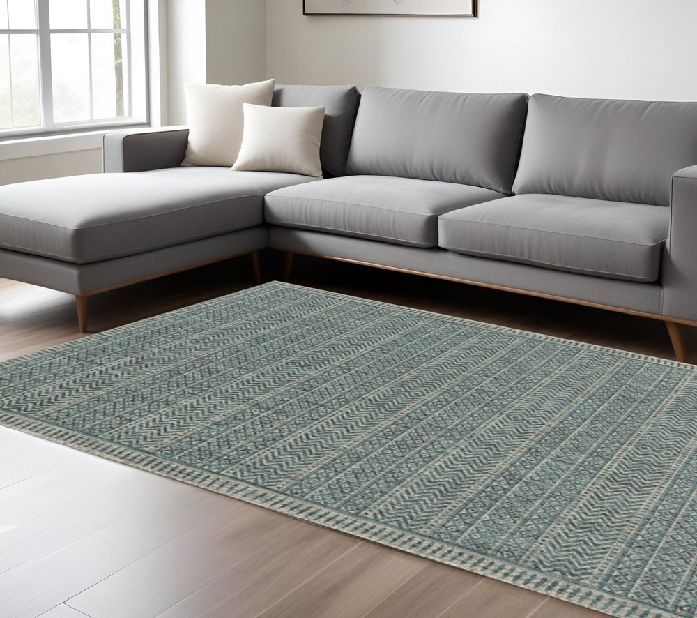 8' X 11' Teal And Beige Geometric Area Rug