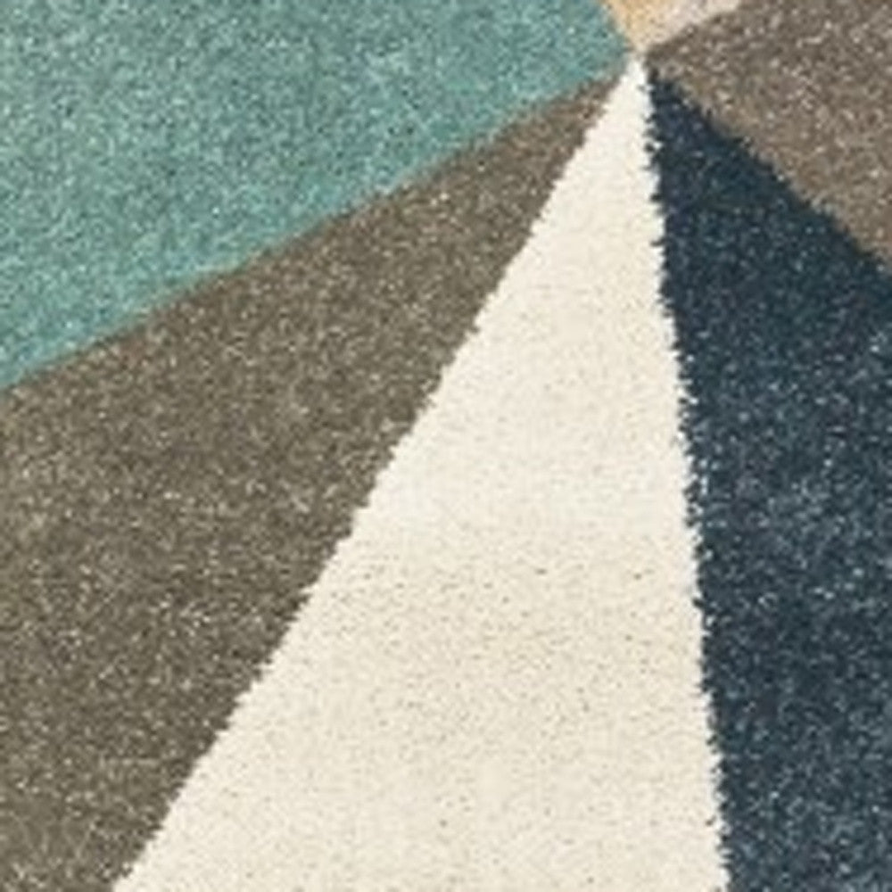 5' X 7' Blue Green And Beige Abstract Geometric Area Rug
