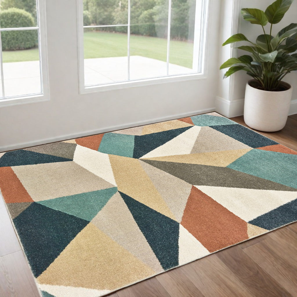 5' X 7' Blue Green And Beige Abstract Geometric Area Rug