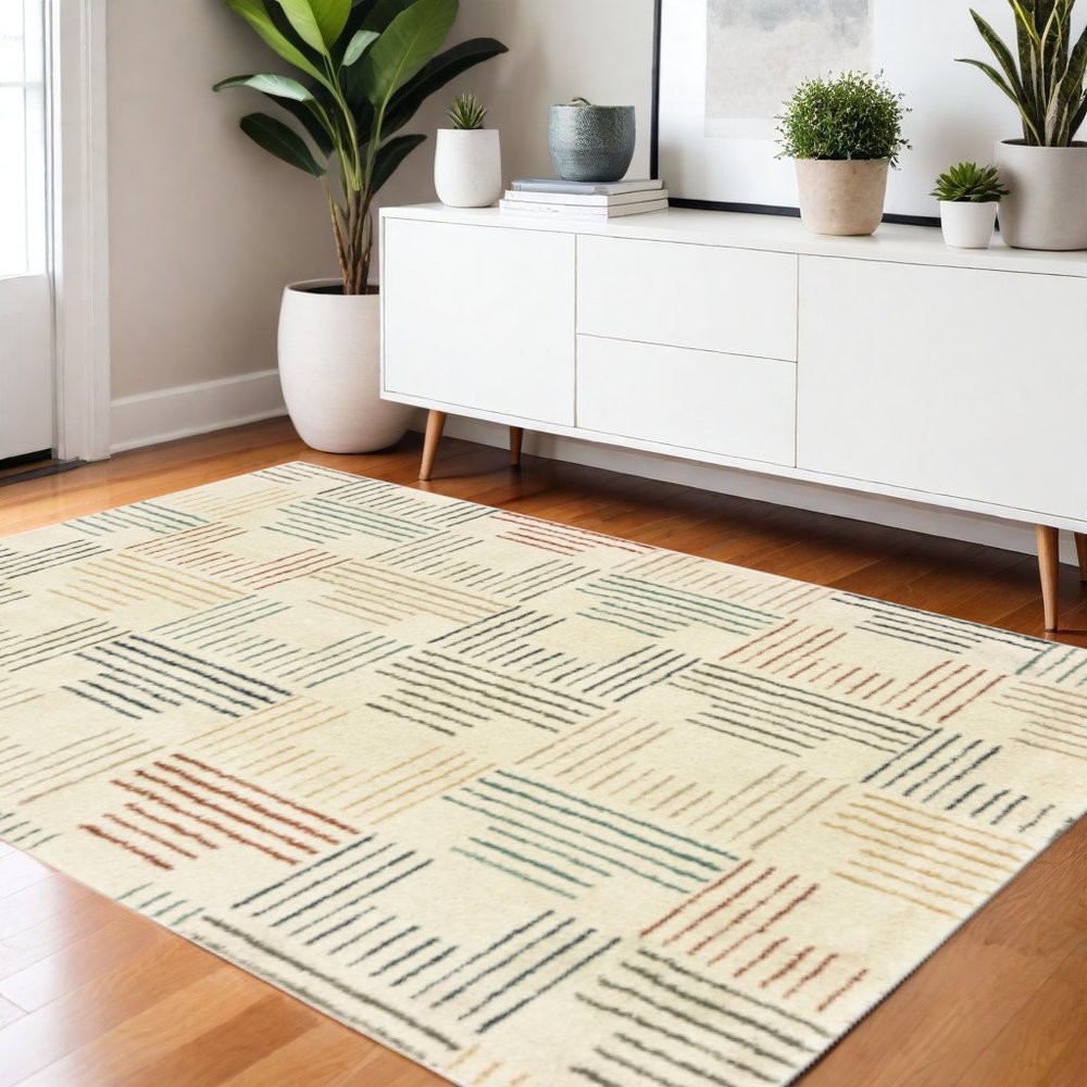 6' X 9' Ivory Blue And Red Geometric Area Rug