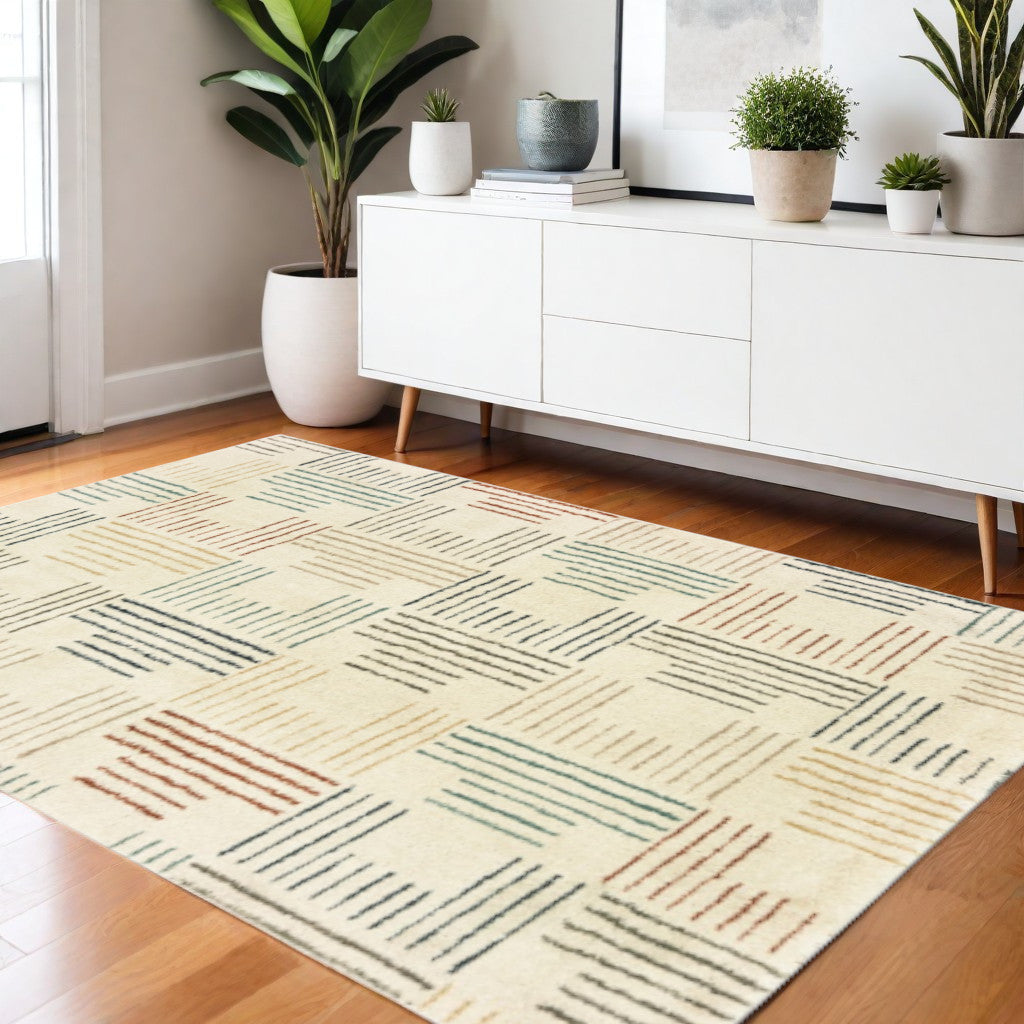 6' X 9' Ivory Blue And Red Geometric Area Rug
