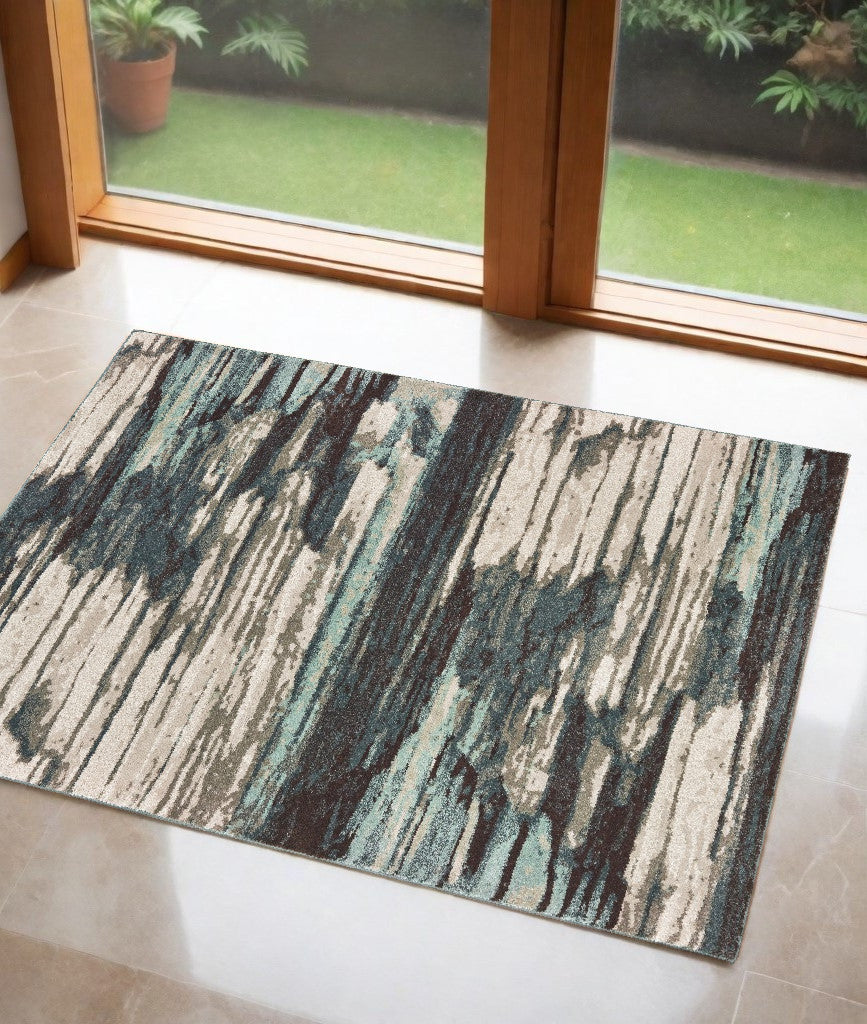 6' X 9' Ivory Blue And Gray Abstract Area Rug