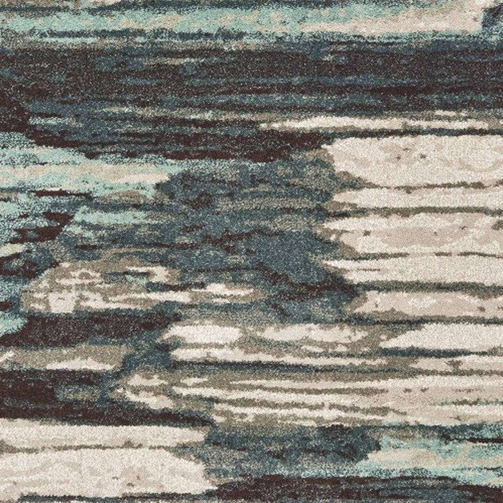 6' X 9' Ivory Blue And Gray Abstract Area Rug
