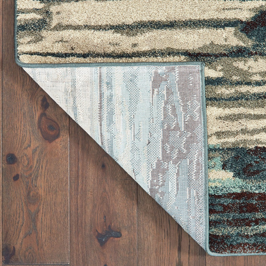 6' X 9' Ivory Blue And Gray Abstract Area Rug