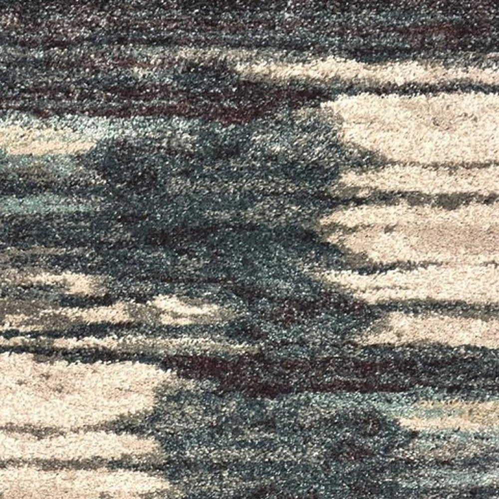 6' X 9' Ivory Blue And Gray Abstract Area Rug