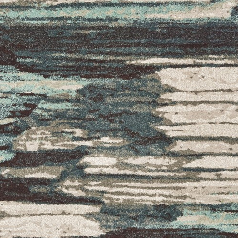 6' X 9' Ivory Blue And Gray Abstract Area Rug