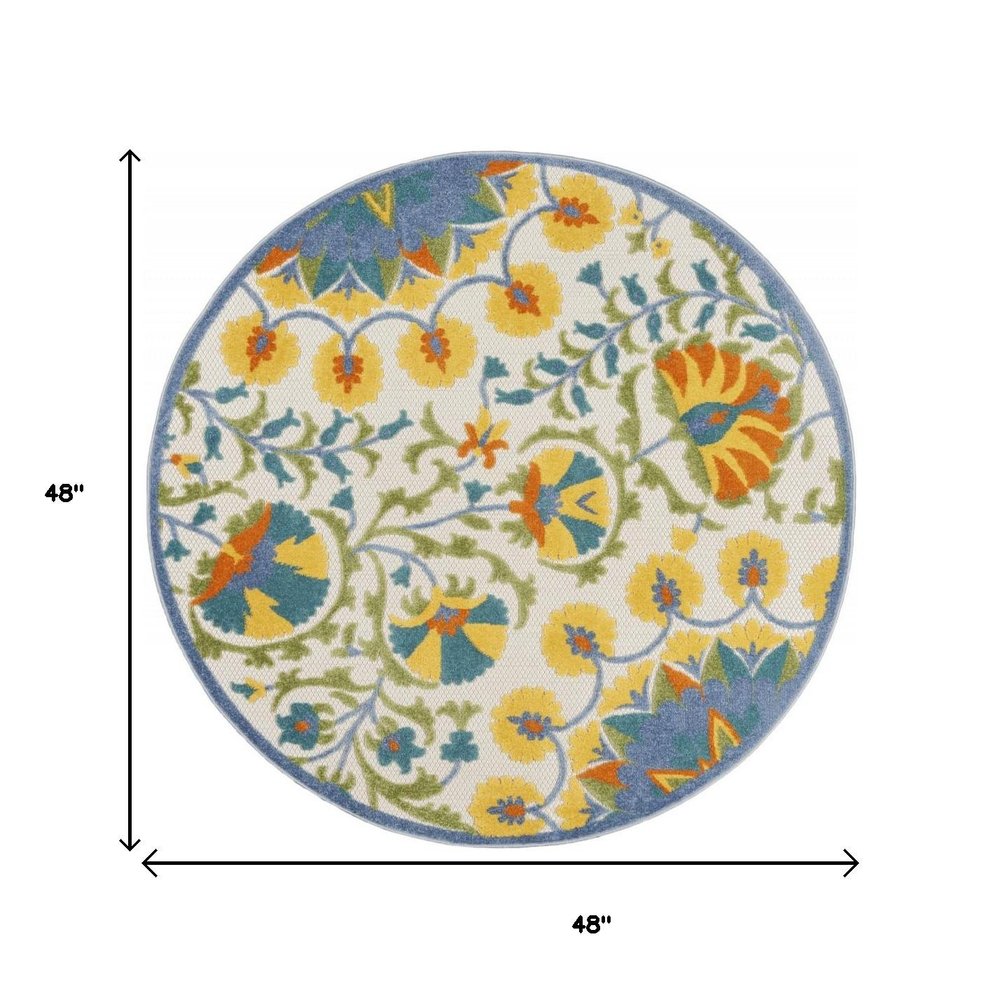 5' X 8' Ivory And Blue Floral Indoor Outdoor Area Rug