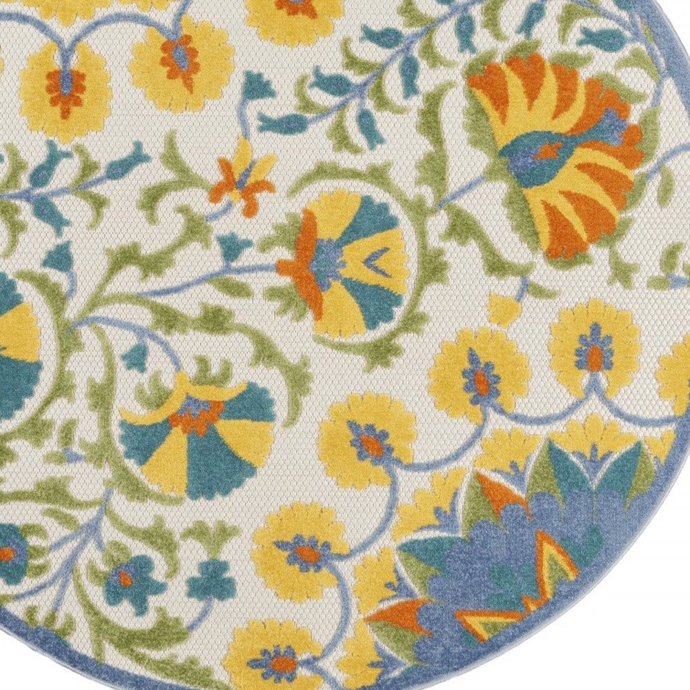 5' X 8' Ivory And Blue Floral Indoor Outdoor Area Rug