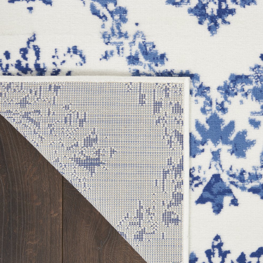 6' X 9' Blue And Ivory Damask Distressed Area Rug