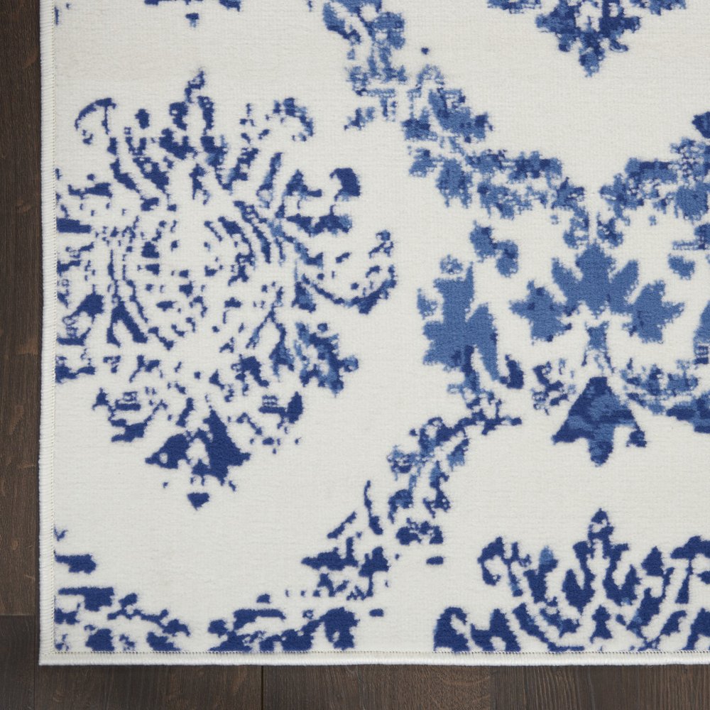 6' X 9' Blue And Ivory Damask Distressed Area Rug