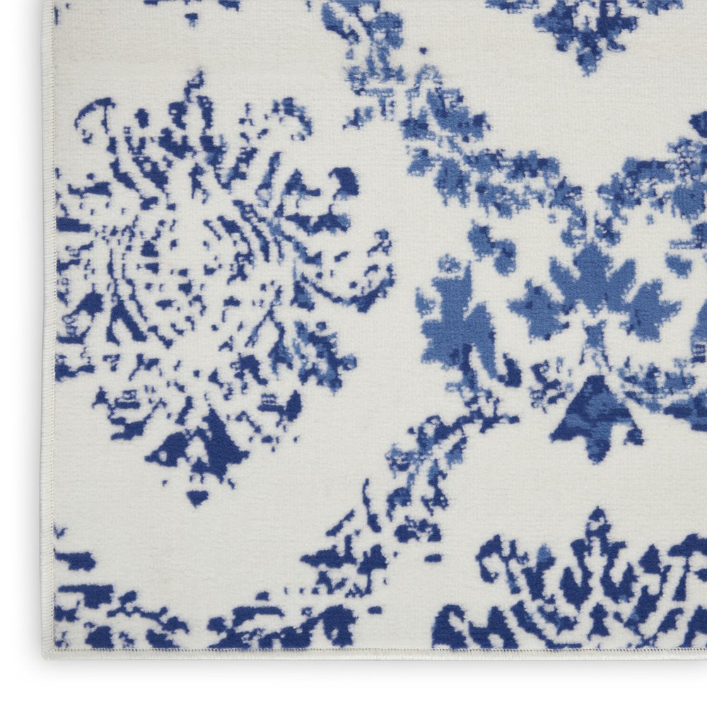 6' X 9' Blue And Ivory Damask Distressed Area Rug