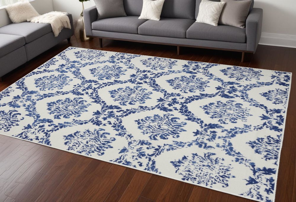 6' X 9' Blue And Ivory Damask Distressed Area Rug
