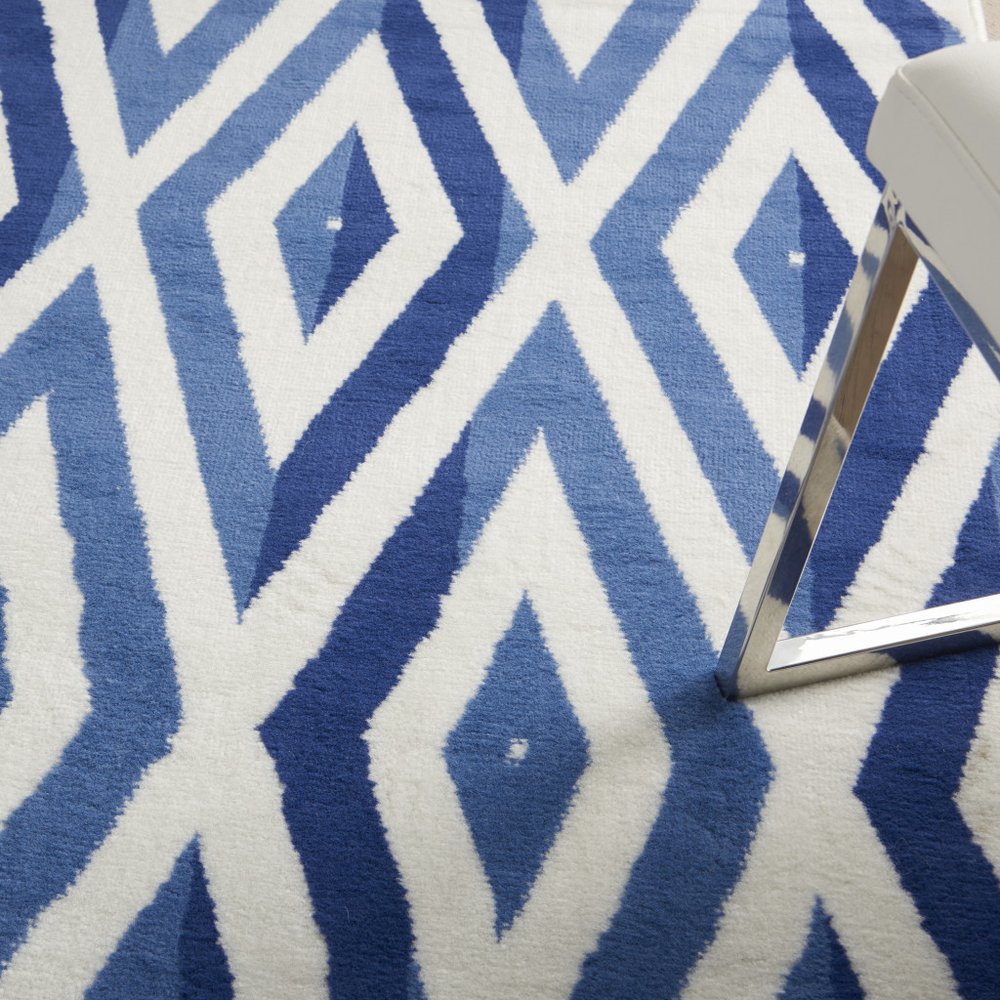5' X 7' Ivory And Blue Geometric Area Rug
