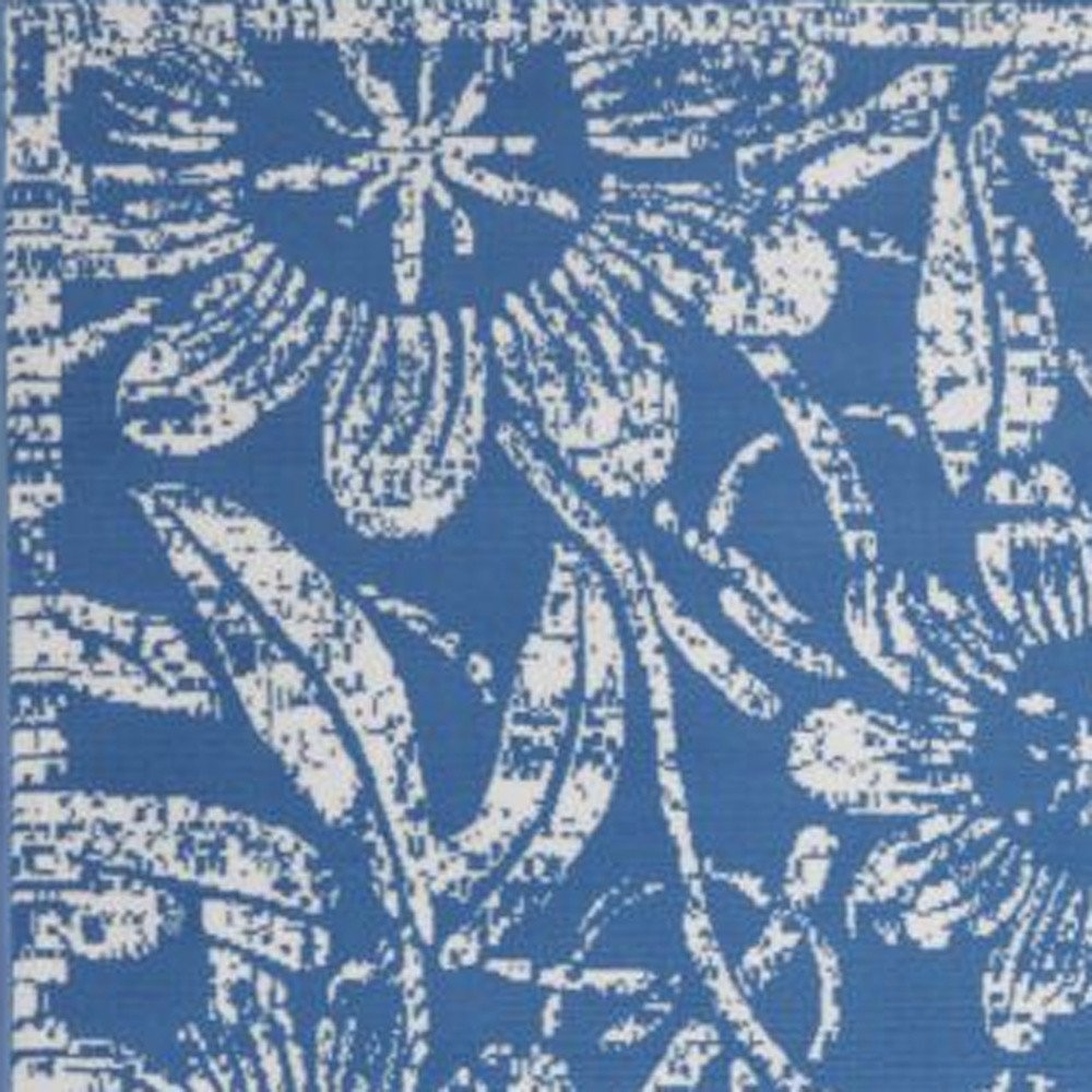 5' X 7' Blue And Ivory Floral Vines Distressed Area Rug