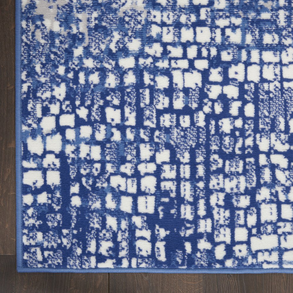 5' X 7' Ivory And Blue Geometric Area Rug