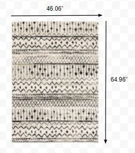 7' X 9' Ivory And Black Abstract Geometric Area Rug