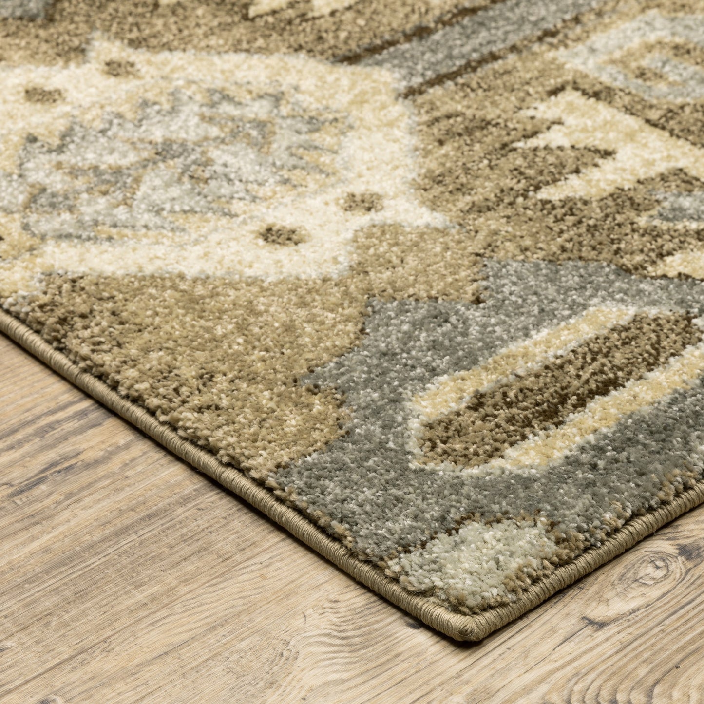 5' X 8' Tan And Gold Medallion Distressed Area Rug