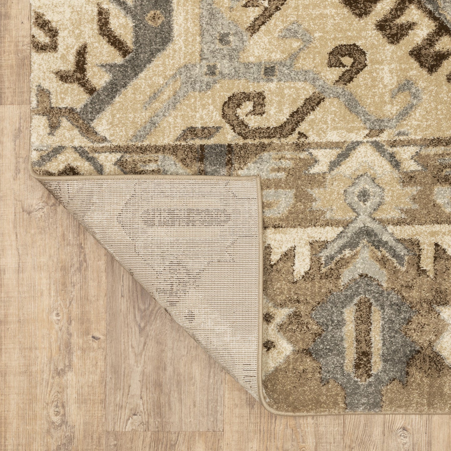 5' X 8' Tan And Gold Medallion Distressed Area Rug