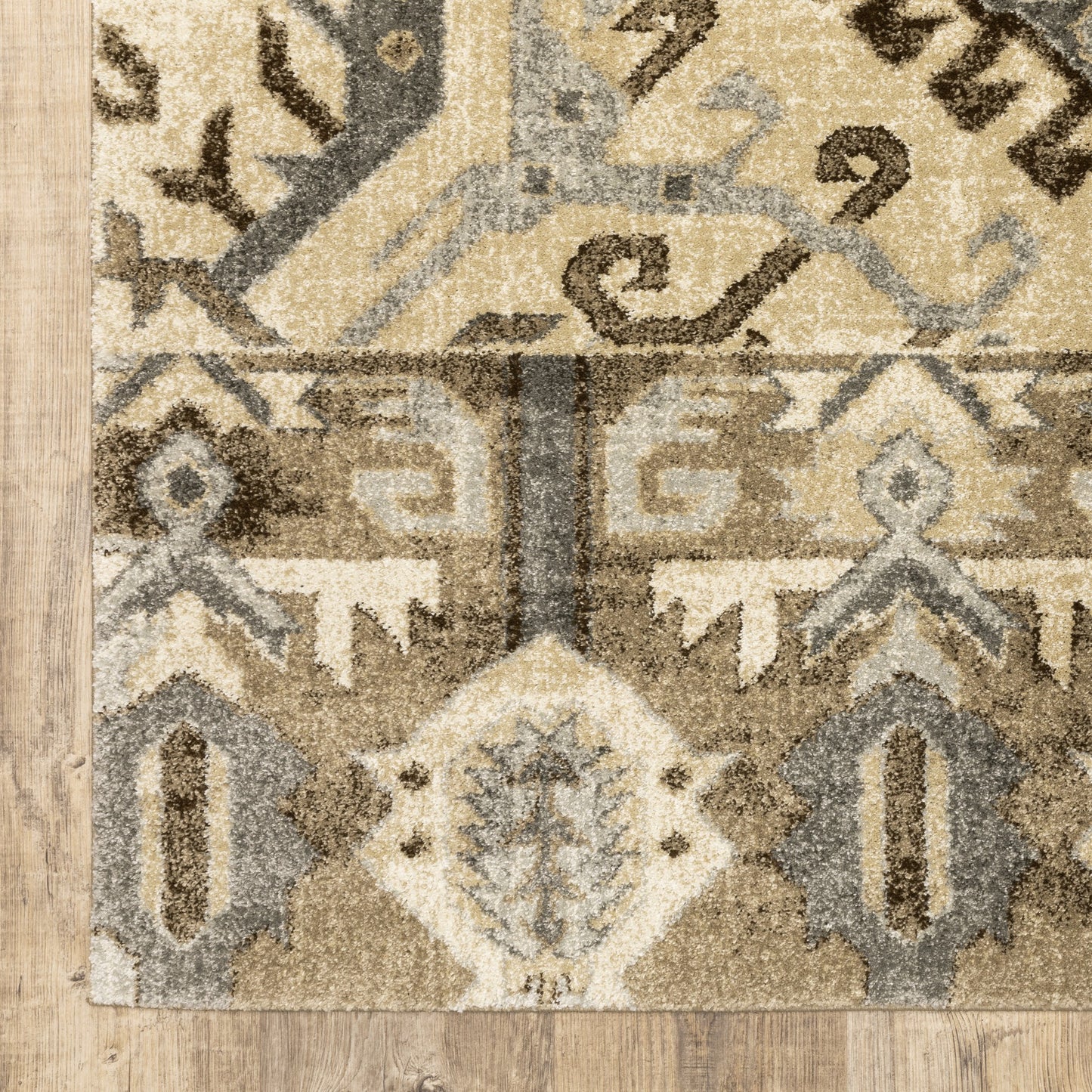 5' X 8' Tan And Gold Medallion Distressed Area Rug