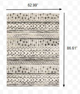 7' X 9' Ivory And Black Abstract Geometric Area Rug