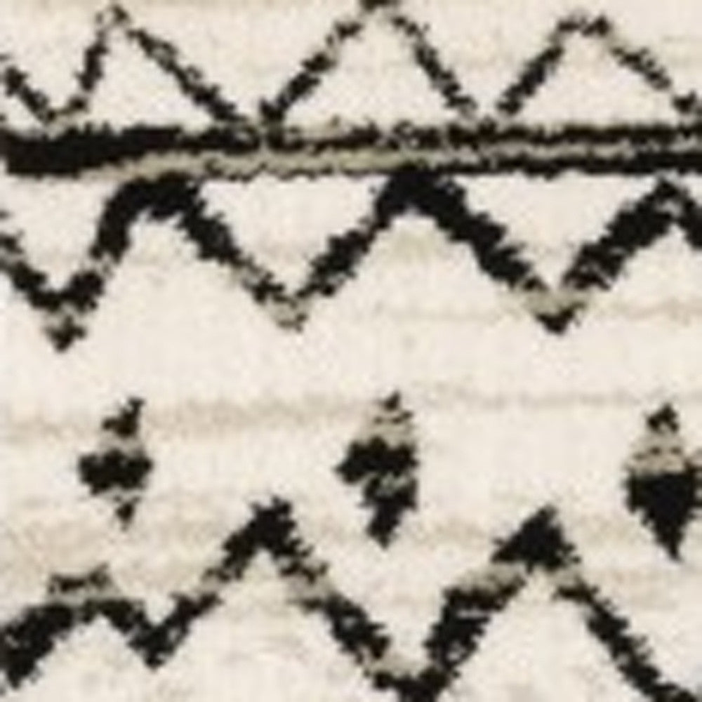 7' X 9' Ivory And Black Abstract Geometric Area Rug
