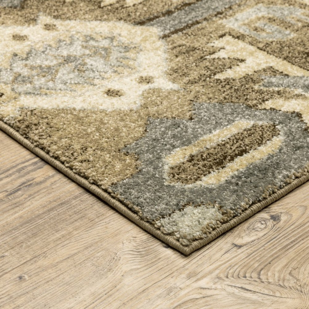 5' X 8' Tan And Gold Medallion Distressed Area Rug