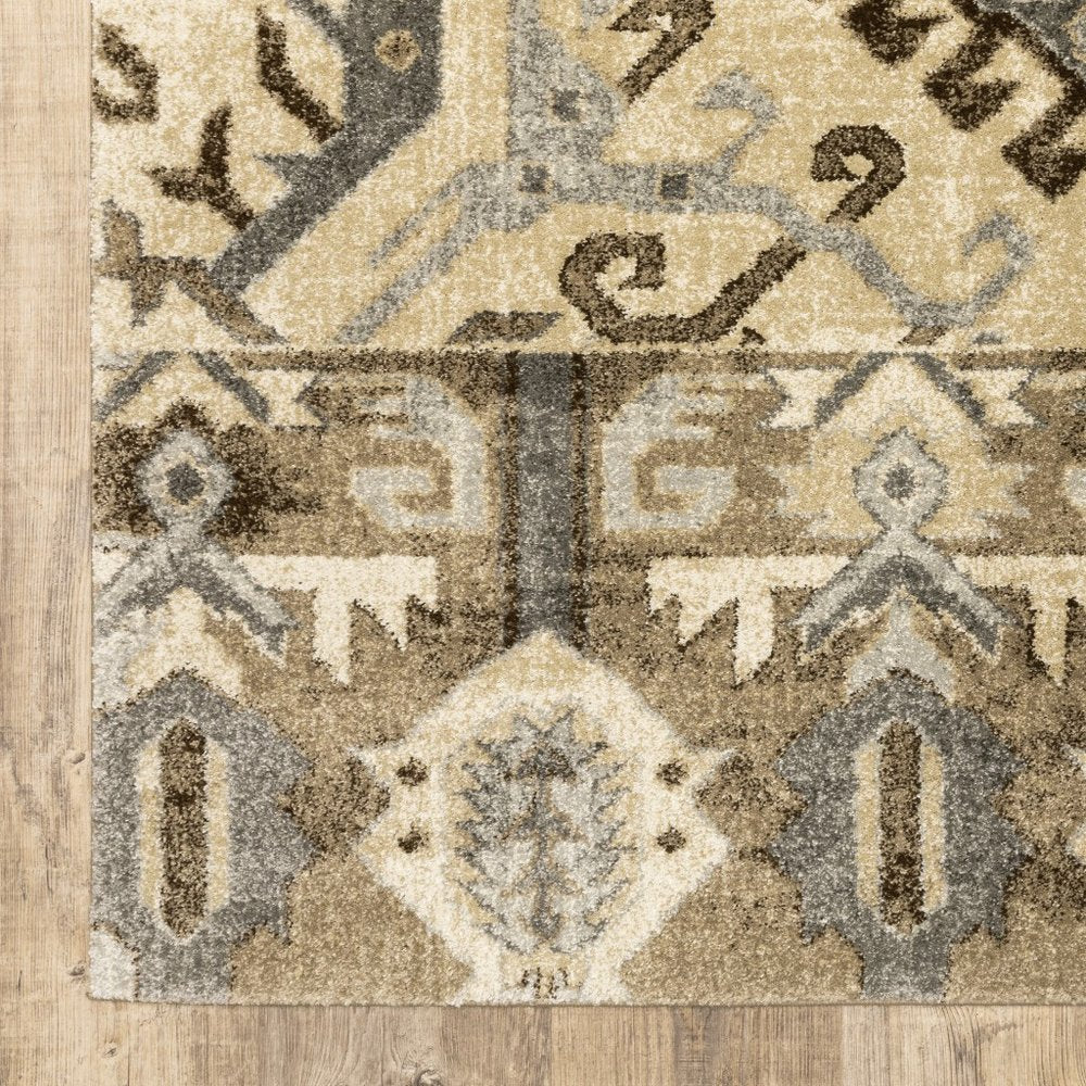 5' X 8' Tan And Gold Medallion Distressed Area Rug
